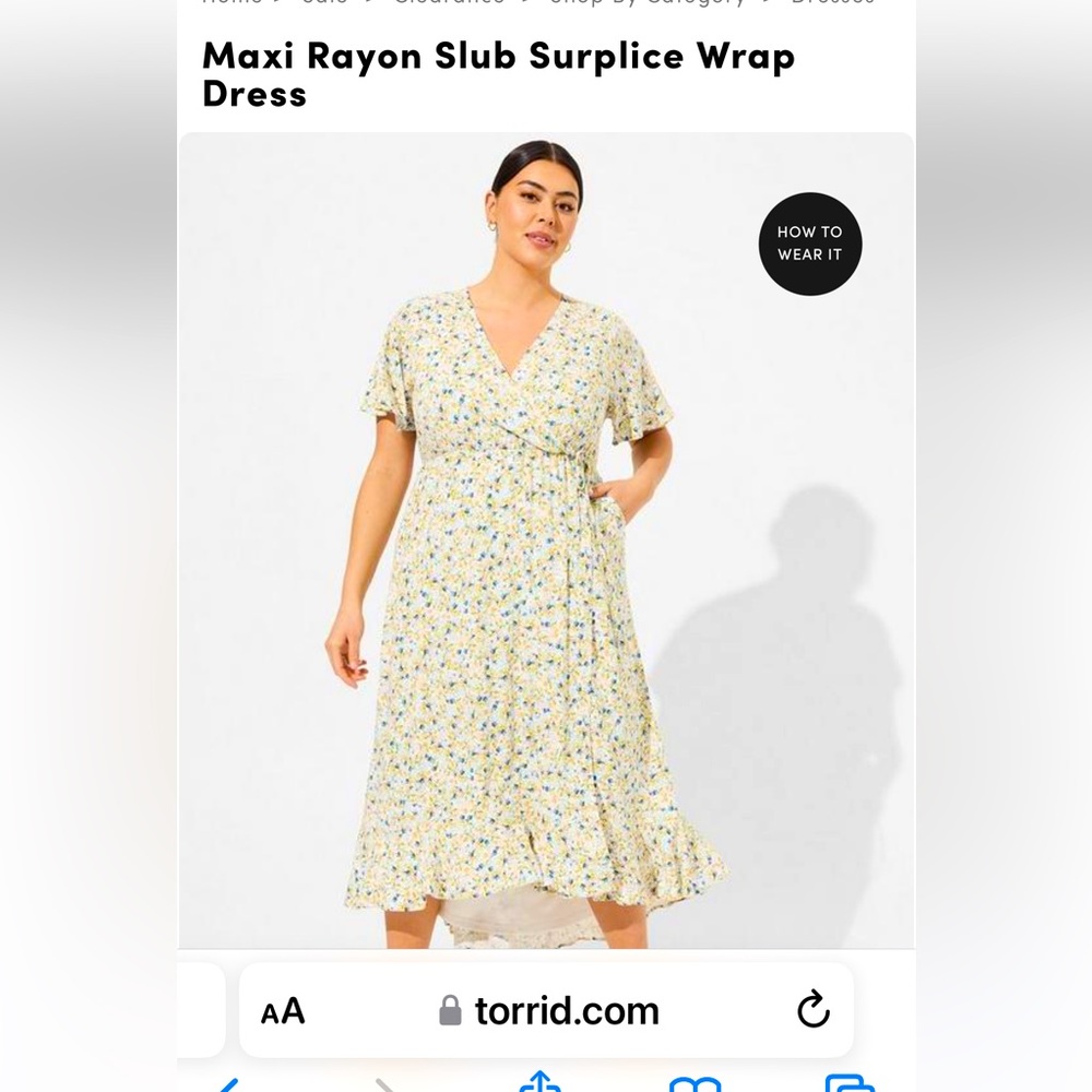 Torrid, brand new with tags. Rayon Maxi wrap dress. Size 0(12)